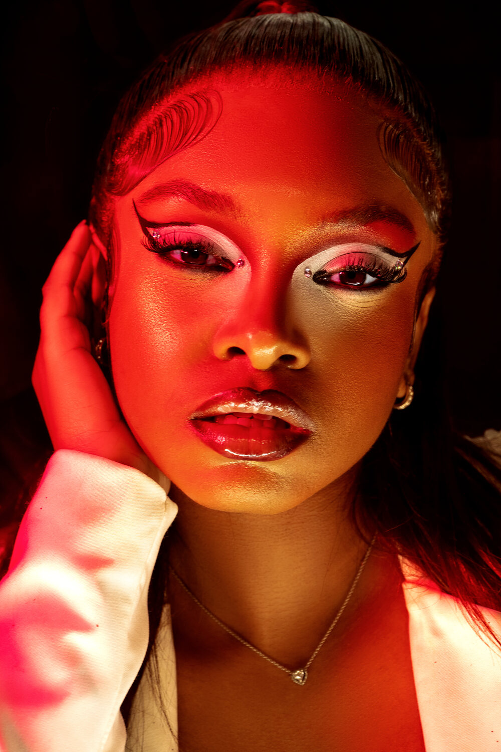Beauty portrait with sculptural red light